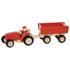 Červený traktor s vlečkou